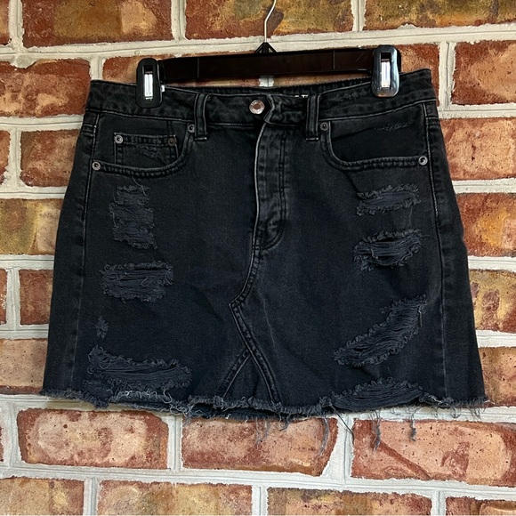 American Eagle Outfitters Dresses & Skirts - American Eagle Outfitters Black denim jeans distressed Mini Skirt. Size 6